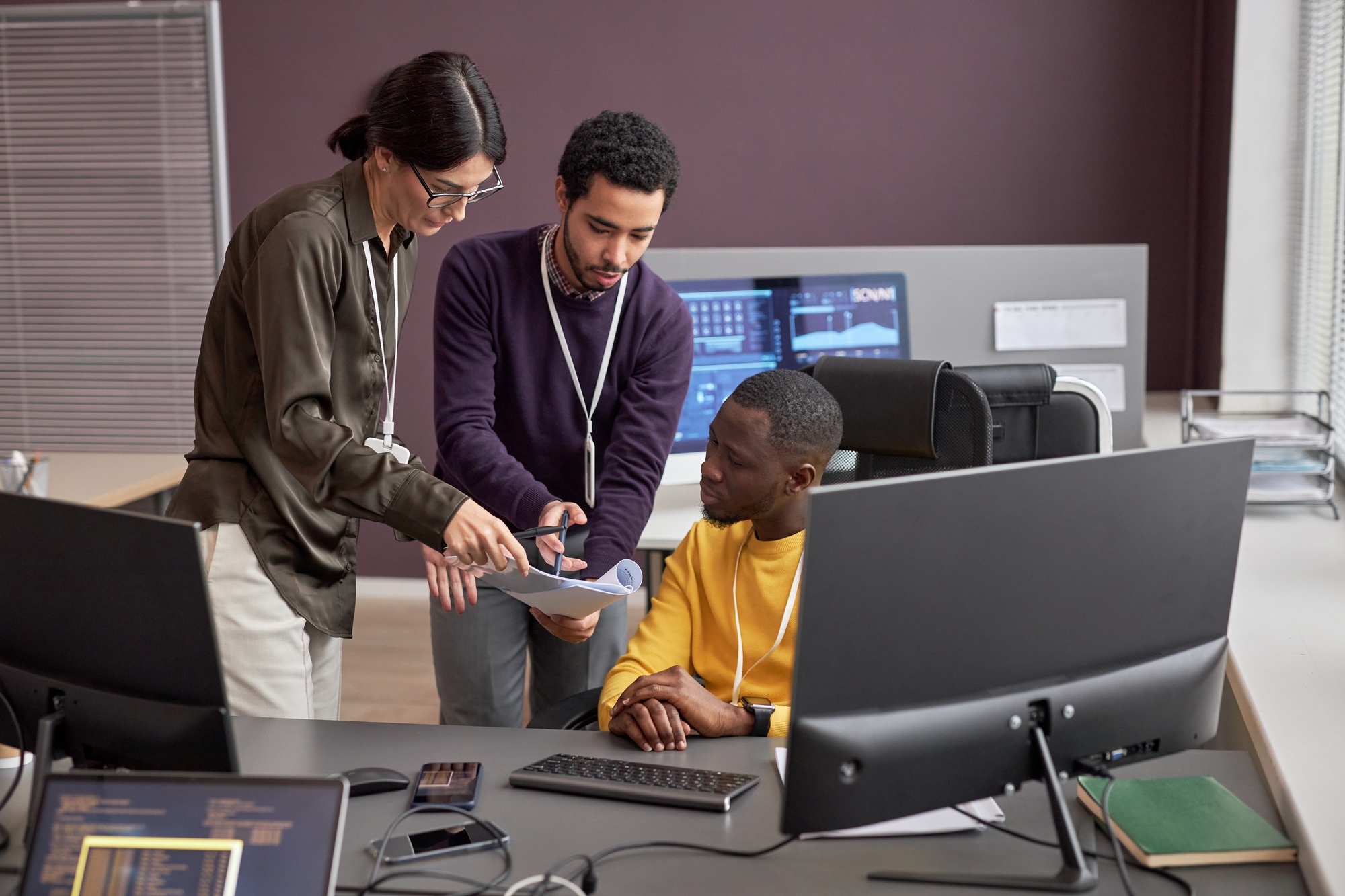 Business people collaborating on project in IT development office